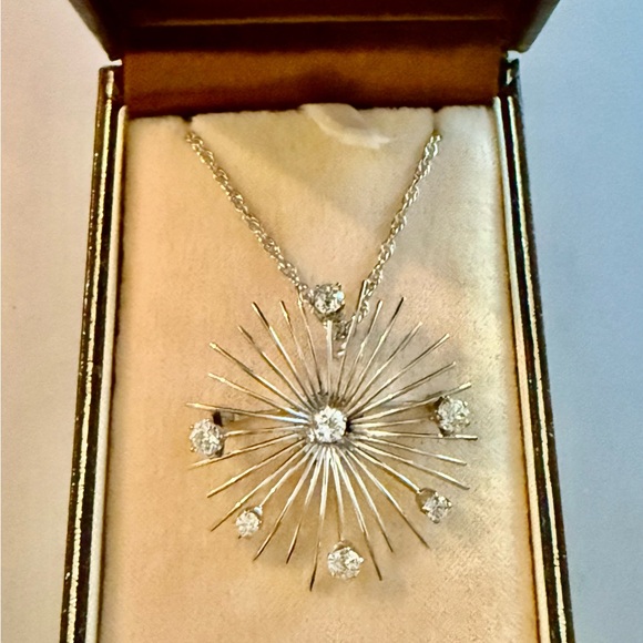 Estate 14 k marked white gold and diamond Sunburst Pendant  Estate 14 k marked white gold and diamond Sunburst Pendant and chain